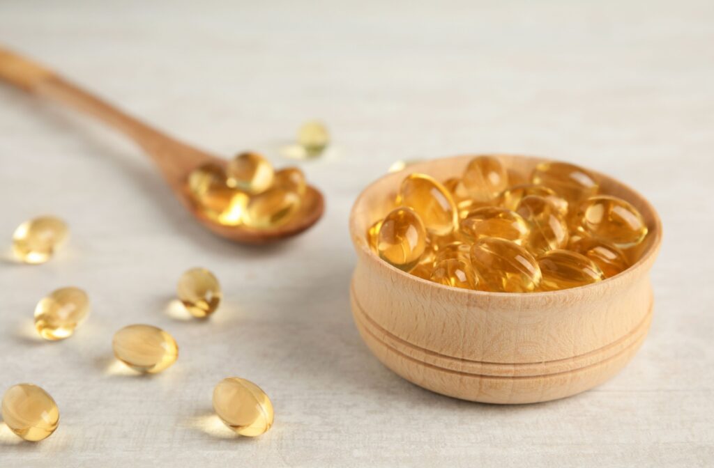 A bowl full of omega-3 capsules, which are beneficial in decreases the irritating symptoms of dry eye disease.